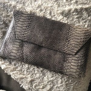 Snake embossed Clutch
